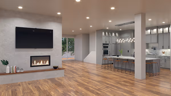 Modern open living space with wooden floors, a wall-mounted TV above a sleek fireplace, and a kitchen island with bar stools and pendant lights.
