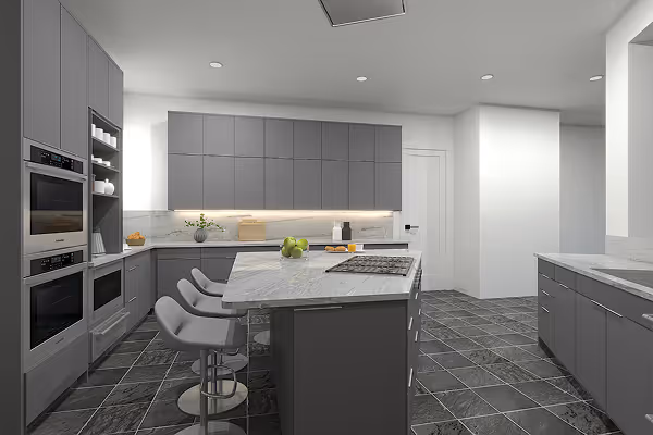 Modern kitchen with gray cabinets, marble countertops, island with bar stools, built-in ovens, and gray tile flooring.